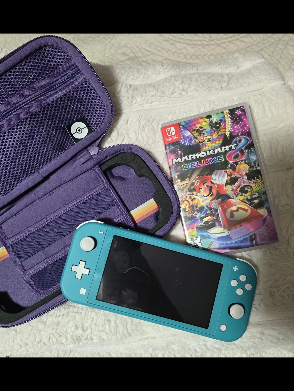 Nintendo Switch Lite Turquoise Handheld Console with Game Case